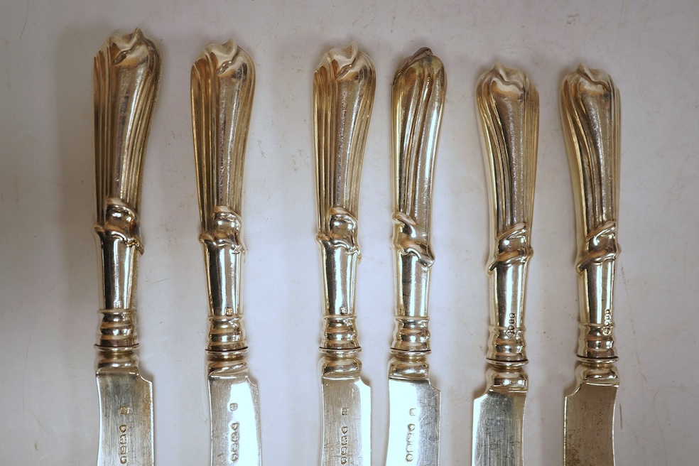 A set of six Victorian silver bladed dessert knives with loaded silver handles, by Lias & Lias, London, 1871, 21cm.